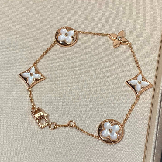 [LORA]STAR AND SUN 5 MOTIF MOP PINK GOLD BRACELET