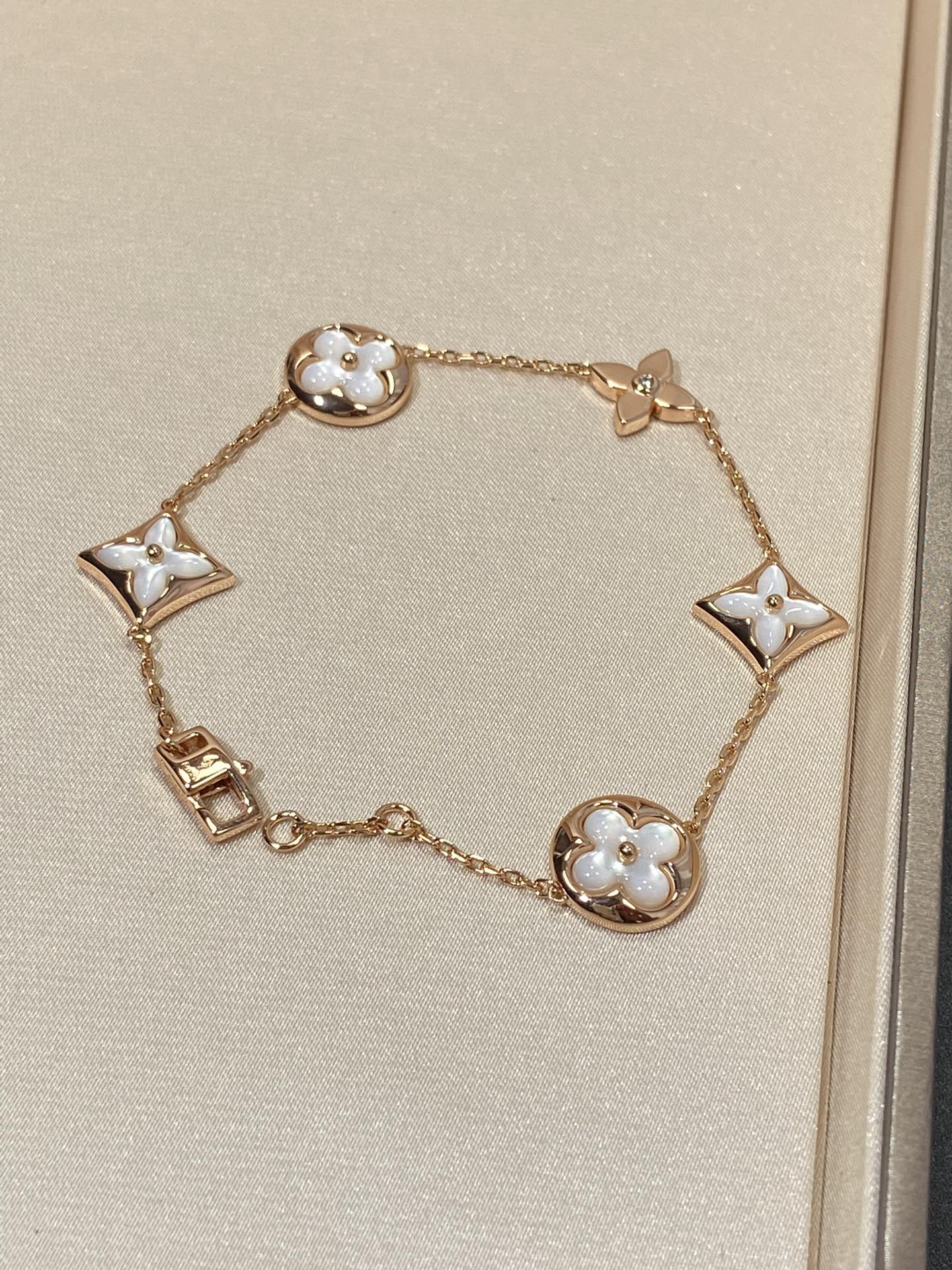 [LORA]STAR AND SUN 5 MOTIF MOP PINK GOLD BRACELET