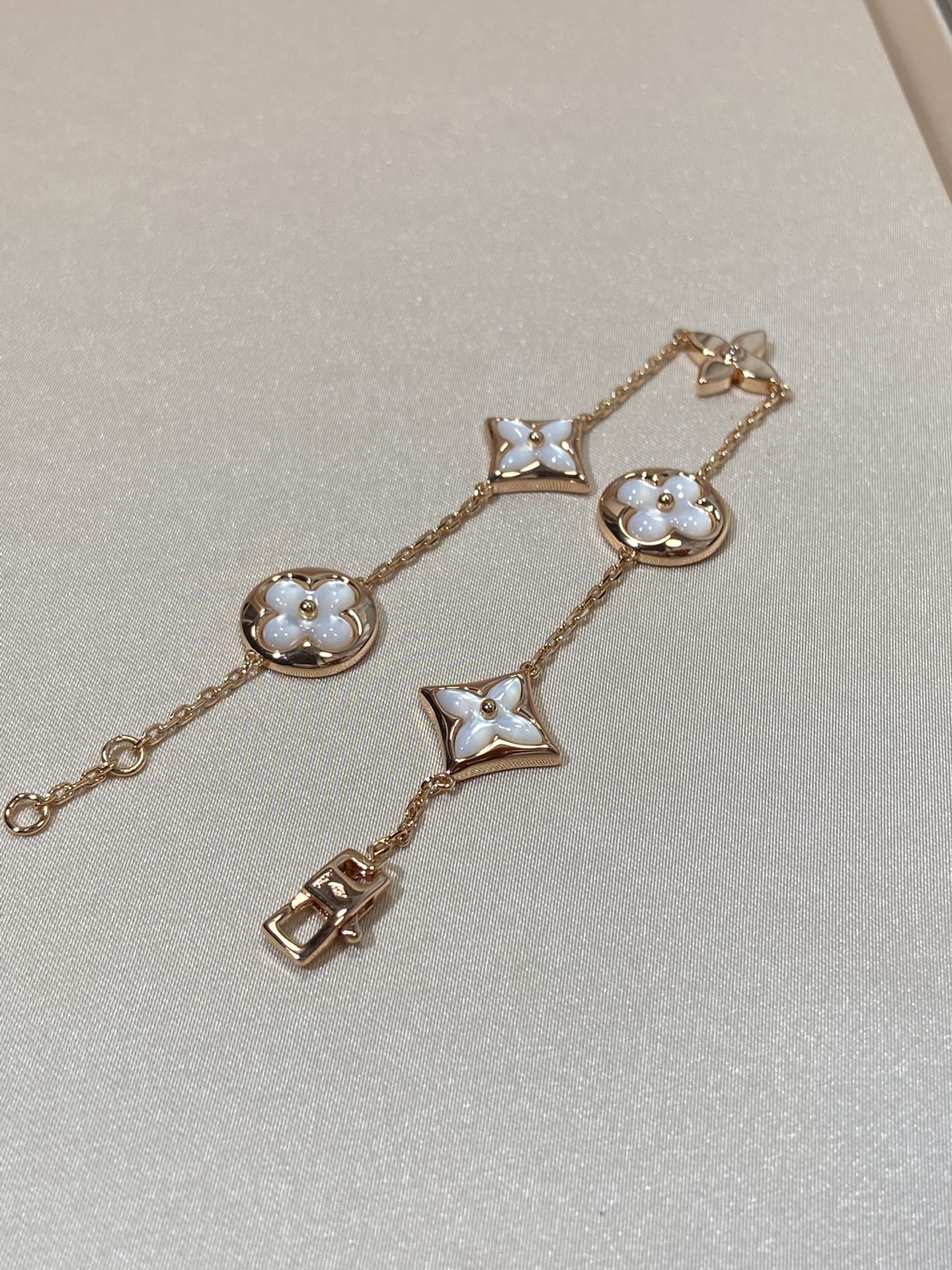 [LORA]STAR AND SUN 5 MOTIF MOP PINK GOLD BRACELET