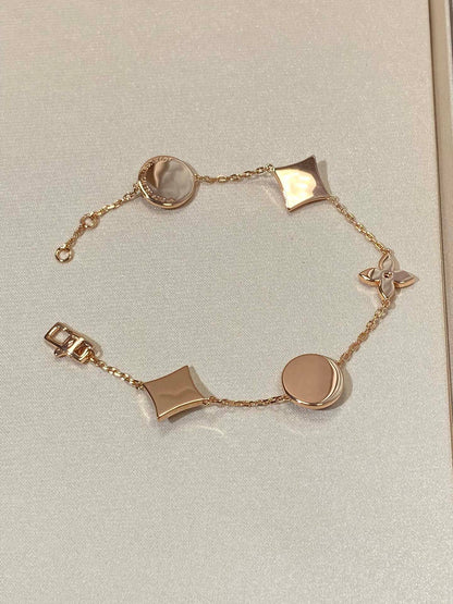 [LORA]STAR AND SUN 5 MOTIF MOP PINK GOLD BRACELET