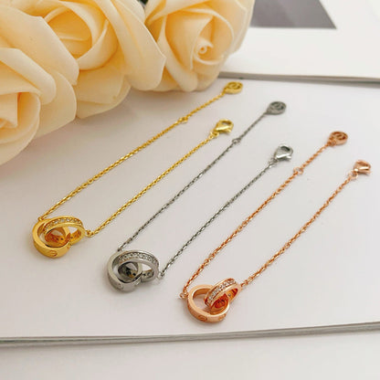 [LORA] LOVE DOUBLE RING HALF DIAMOND BRACELET